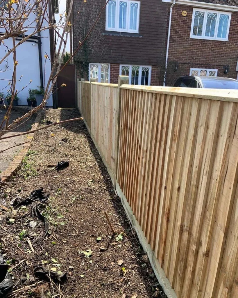 This is a photo of feather edge fencing installed in a residential property by Fast Fix Fencing Ashford